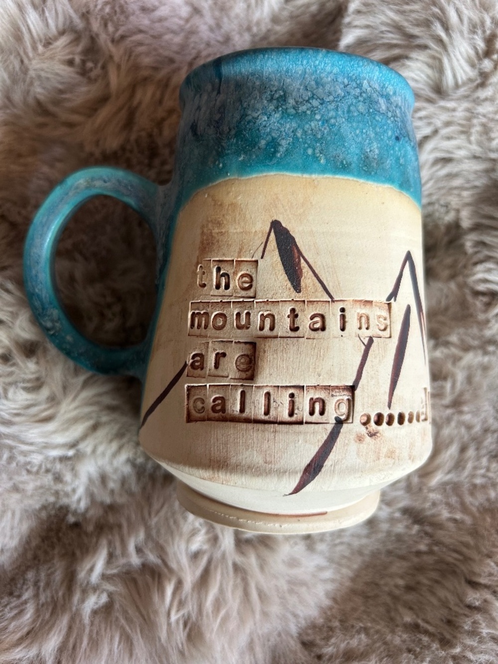 Original Alex Apland Studio Mug, 16 ounce: "The Mountains Are Calling... & I Mus